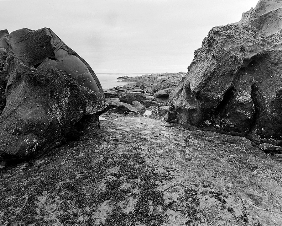From an alcove under the cliffs